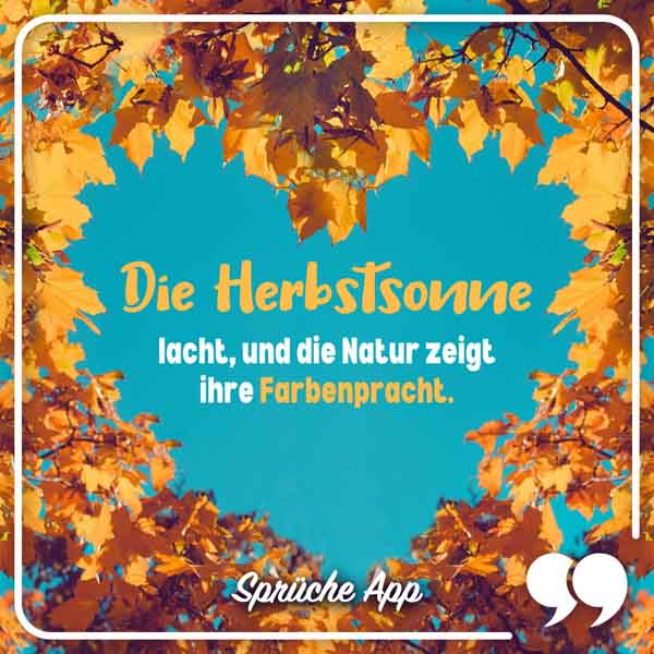 Bunte Herbstblätter, die ein Herz am Himmel formen mit Spruch: „Die Herbstsonne lacht, und die Natur zeigt ihre Farbenpracht."